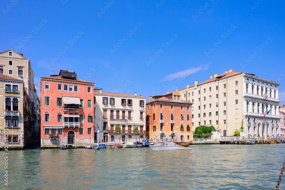 VENICE, ITALY - MAY, 2017: Venice houses facades and the grand canal in a sunny day in Italy