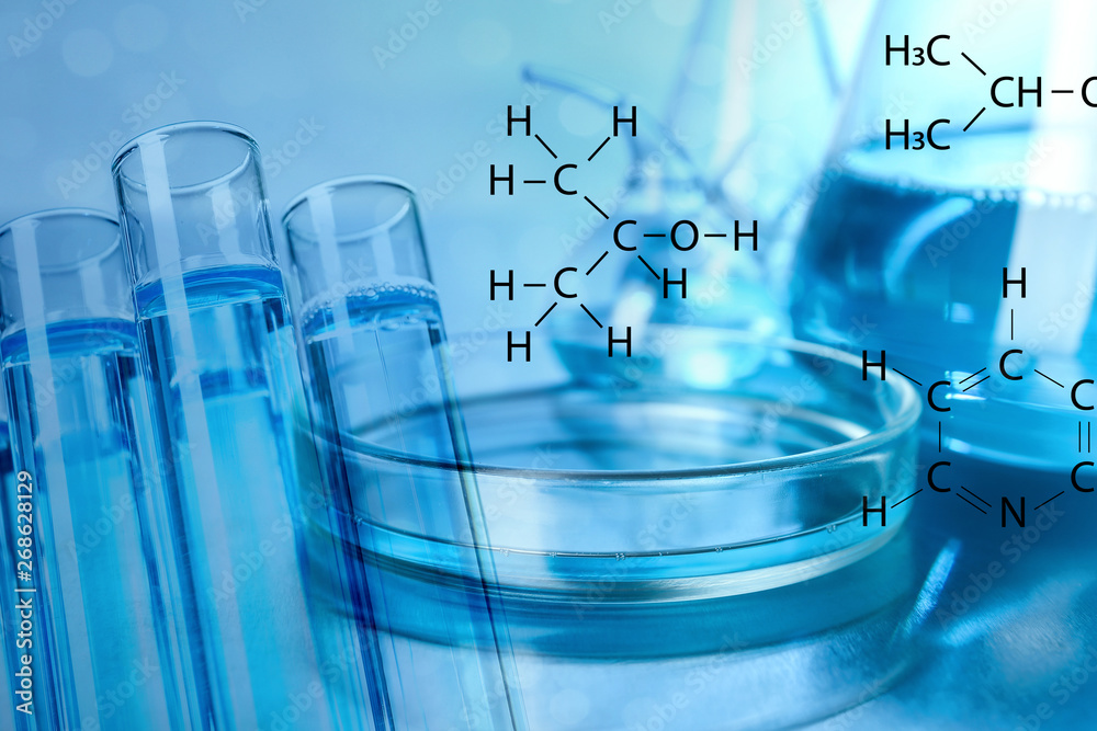 Different laboratory glassware on table, double exposure. Solution chemistry Different laboratory glassware on table, double exposure. Solution chemistry