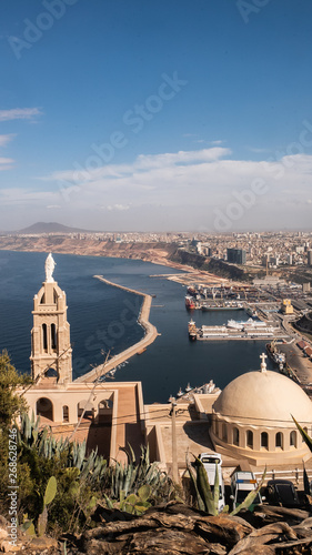 Mountain top cathedral and panorama skyline view of Oran, Algeria