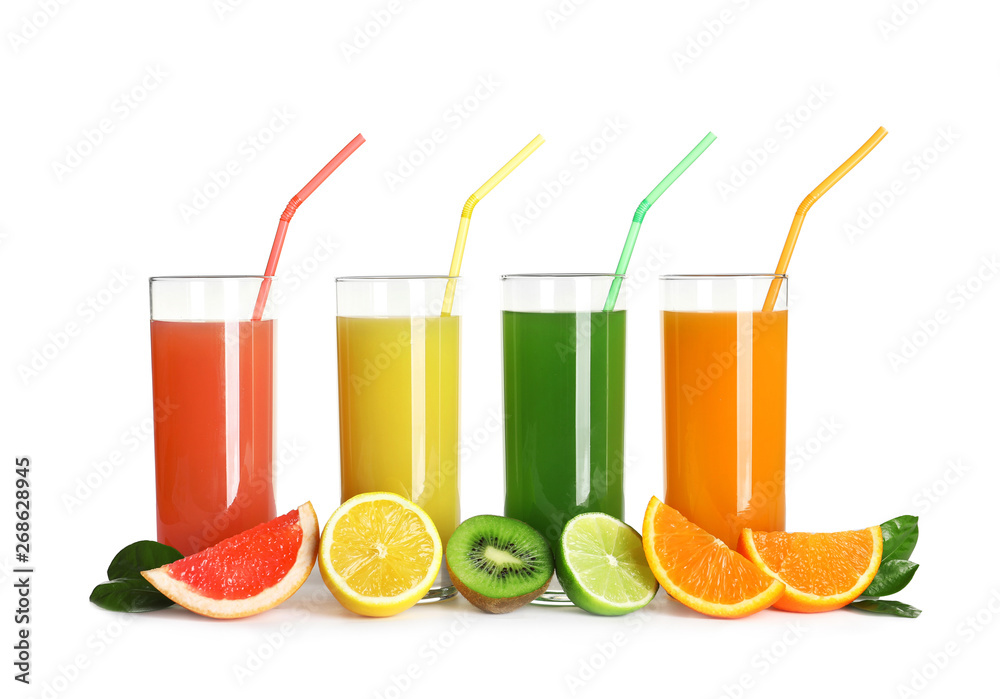 Fototapeta premium Glasses with different juices and fresh fruits on white background