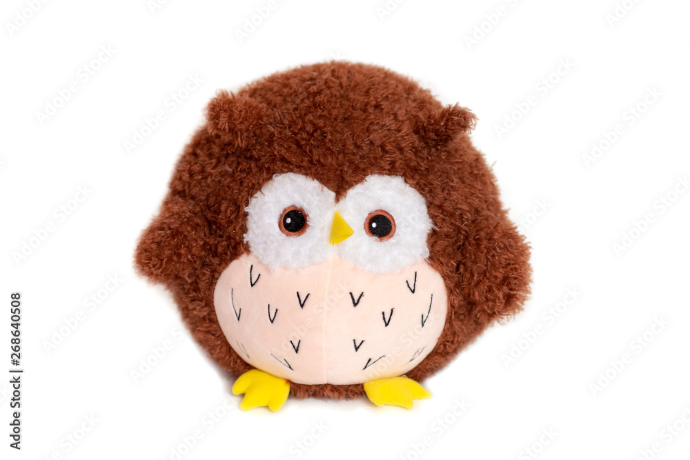 Owl doll brown fur, isolated on white background. Owl doll brown fur, isolated on white background.