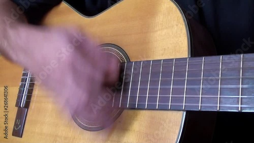 playing guitar close up