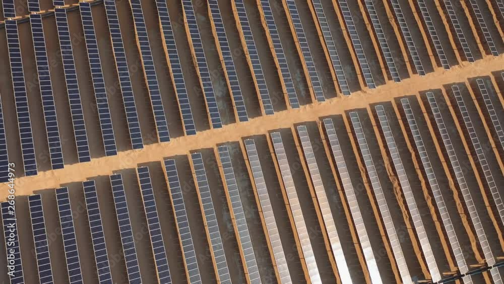 AERIAL. Top view of huge solar energy plant in the desert. AERIAL. Top view of huge solar energy plant in the desert.
