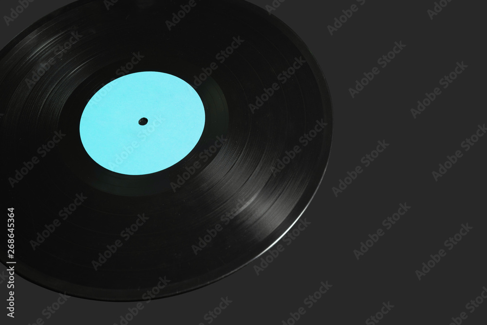 Obraz premium Black vinyl record lp album disc with blue blank label