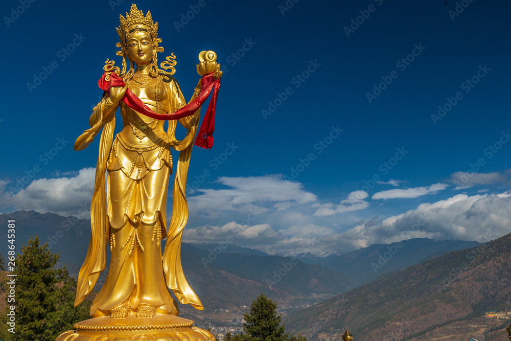 Gilded Bodhisattva statue in Thimphu - obrazy, fototapety, plakaty 