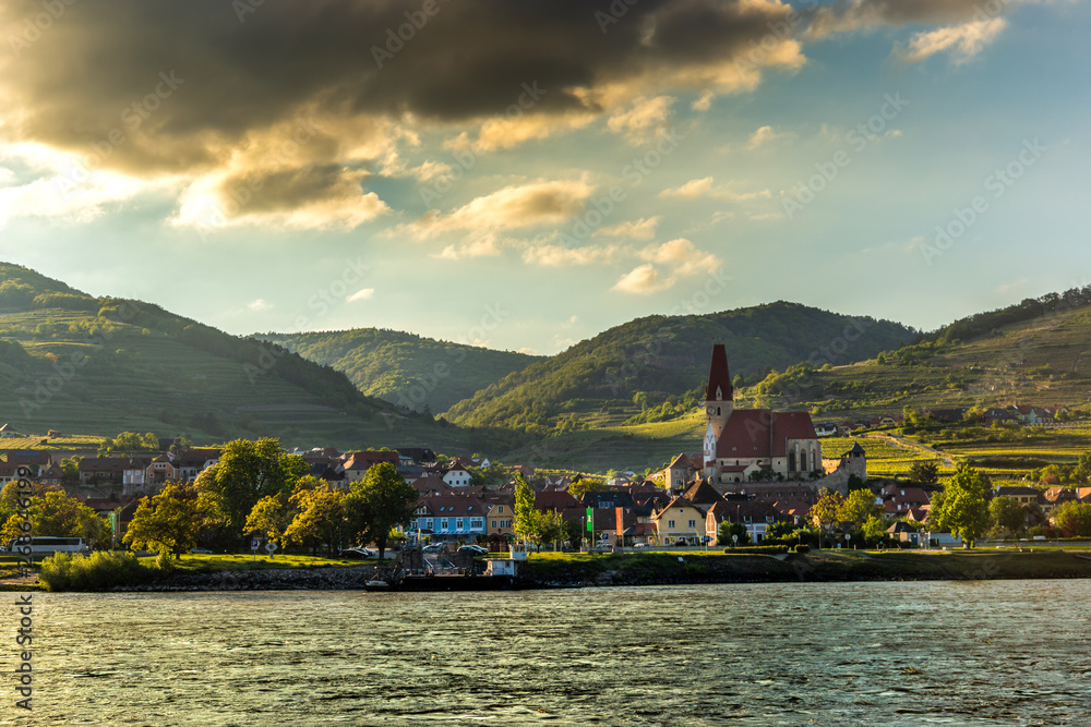 Fototapeta premium Scenic View into the Wachau with the river Danube and town Weissenkirchen in Lower Austria.