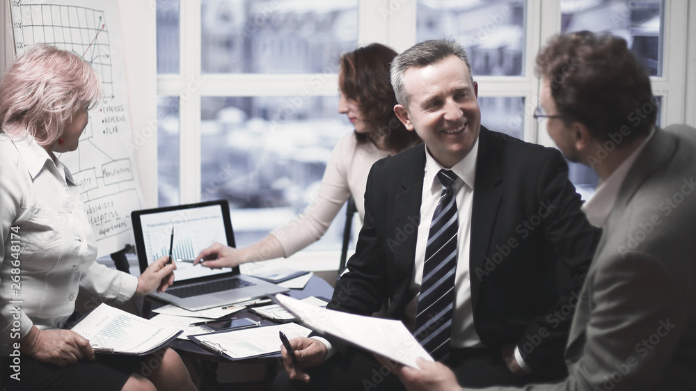 custom made wallpaper toronto digitalexperienced employees discussing problems in the office.