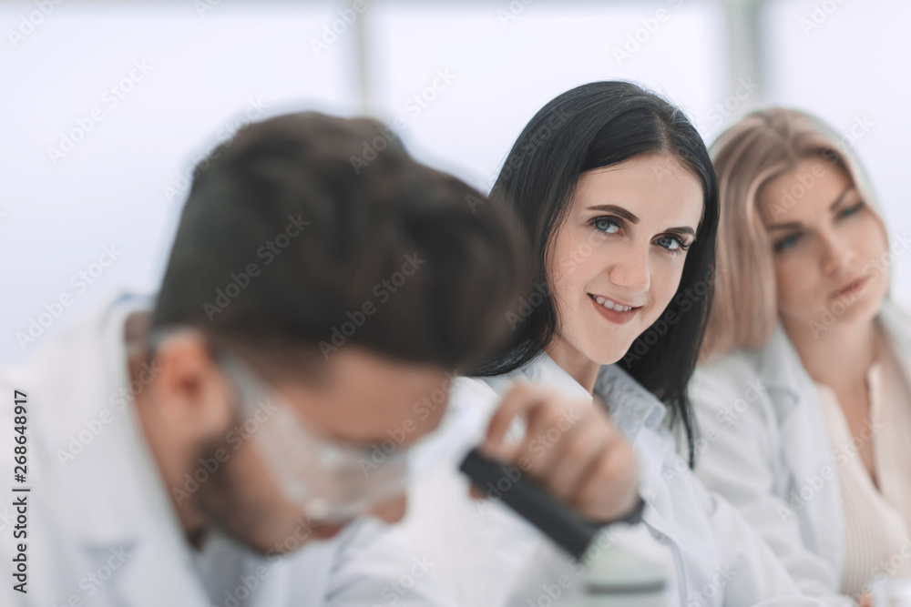 close up.modern woman scientist in the workplace in the laboratory. close up.modern woman scientist in the workplace in the laboratory.