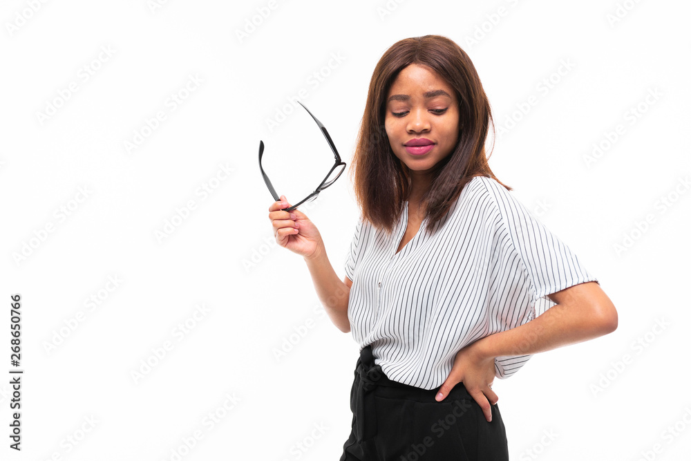portrait of attractive young afro-american girl possing with glasses on background portrait of attractive young afro-american girl possing with glasses on background