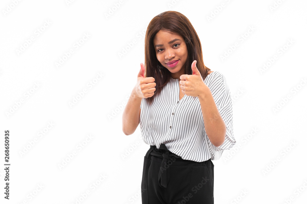 portrait of african young girl possing and gesticulates hands on background portrait of african young girl possing and gesticulates hands on background