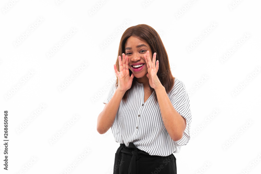 portrait of african young girl possing and gesticulates hands on background portrait of african young girl possing and gesticulates hands on background