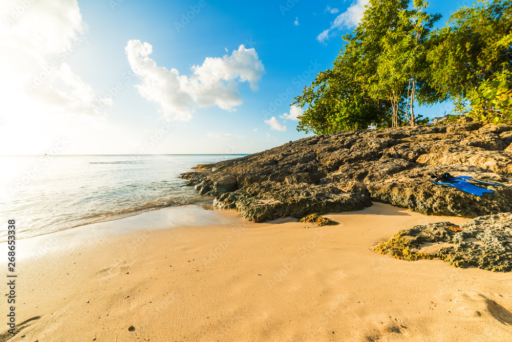 Sun shining over Le Souffleur beach in Guadeloupe Sun shining over Le Souffleur beach in Guadeloupe