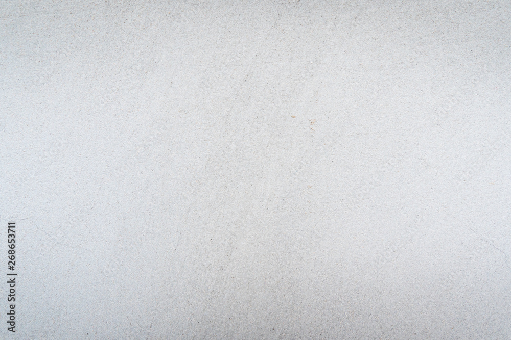 Fototapeta premium Texture of concrete wall surface painted with white color. Suitable for use as a pattern or background image for use in graphic design.