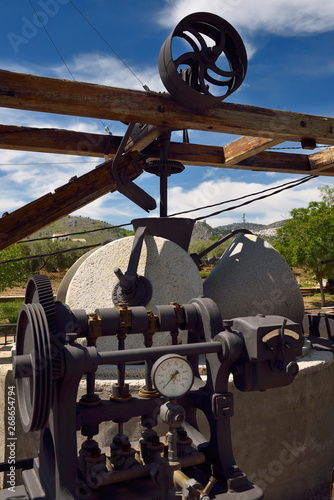 Olive press machinery at Nicols Hostel Restaurant near Luque Spain photo