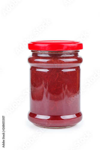 Glass jars with strawberry jam on white background