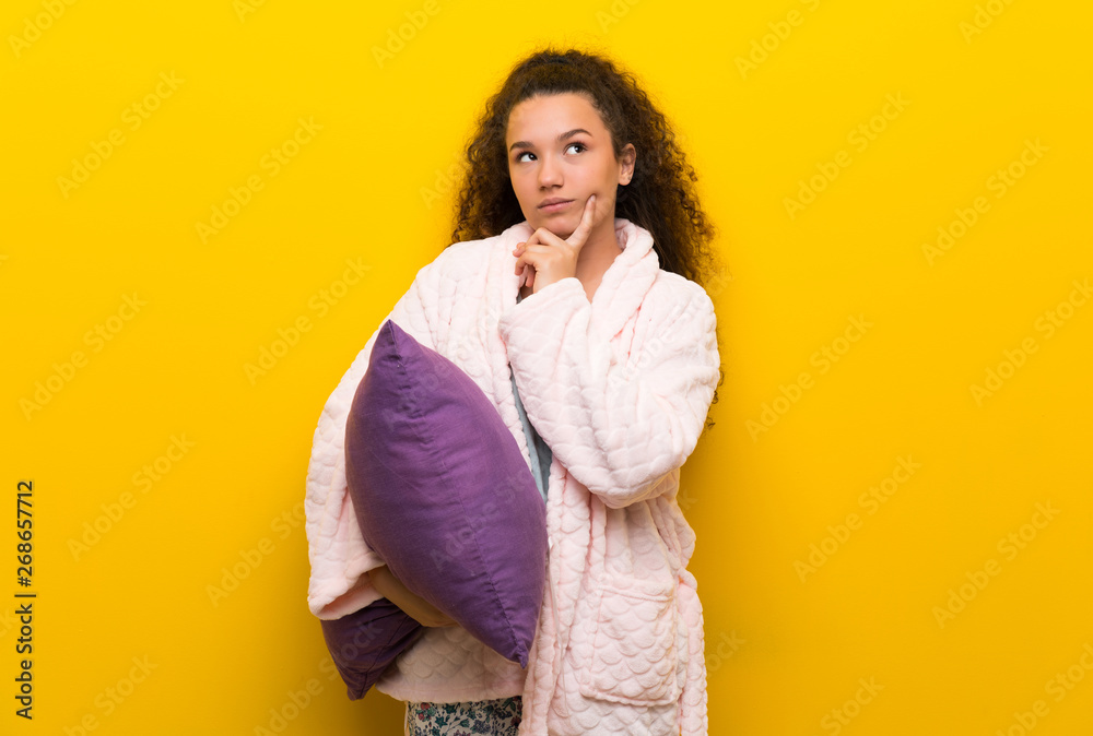 Teenager girl in pajamas Looking front Teenager girl in pajamas Looking front