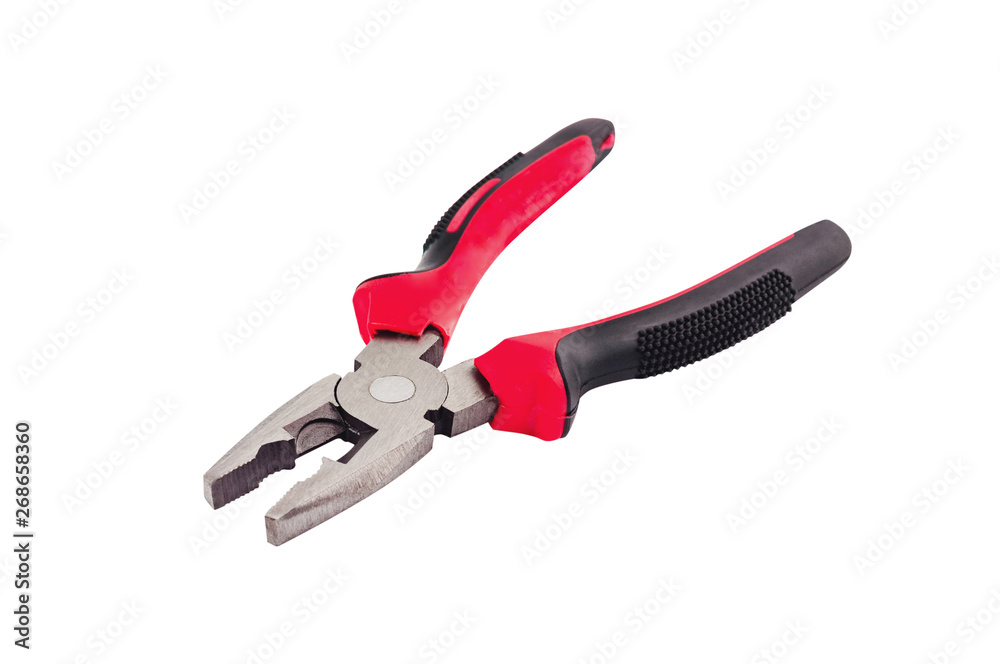 One new metal pliers with rubber handles black and red color isolated on white background. Repair or building concept One new metal pliers with rubber handles black and red color isolated on white background. Repair or building concept