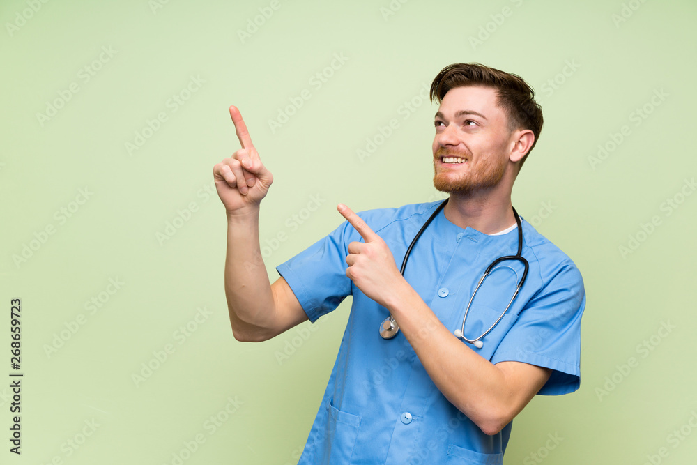 Surgeon doctor man pointing with the index finger a great idea