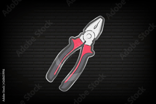 Colored glass icon of metal pliers with black and red color rubber handles on background of brick wall