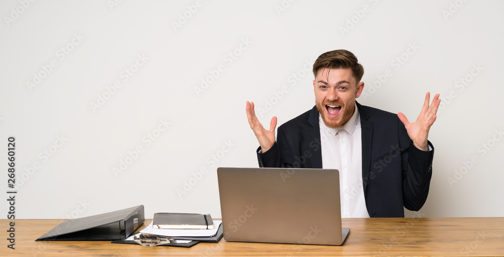 Businessman in a office smiling a lot Businessman in a office smiling a lot