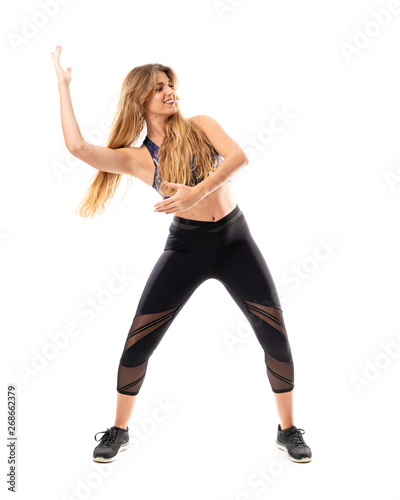 Ballerina dancing over isolated white background