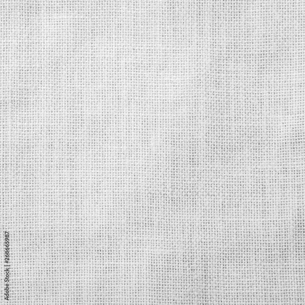 Hessian sackcloth woven fabric texture background light white grey color Hessian sackcloth woven fabric texture background light white grey color