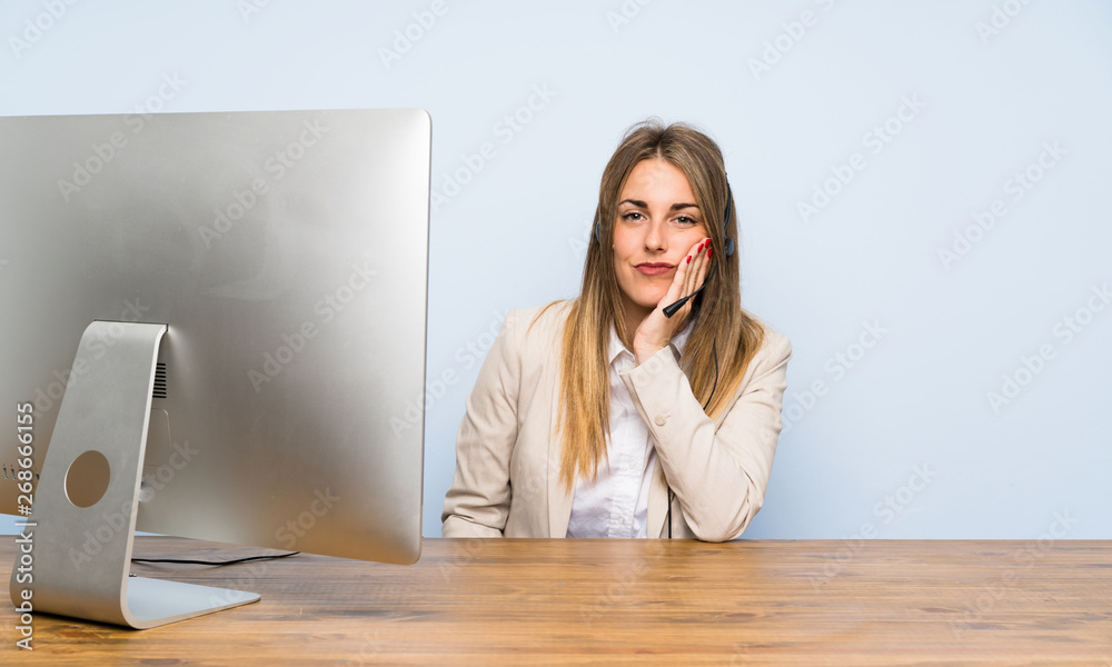 Young telemarketer woman unhappy and frustrated Young telemarketer woman unhappy and frustrated