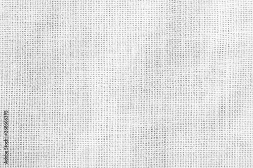 Hessian sackcloth woven texture pattern background in light white grey