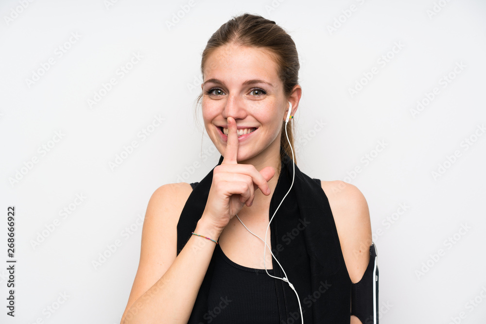 Young sport woman over isolated white background doing silence gesture Young sport woman over isolated white background doing silence gesture