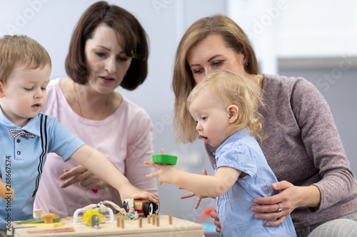 Children play with educatio...