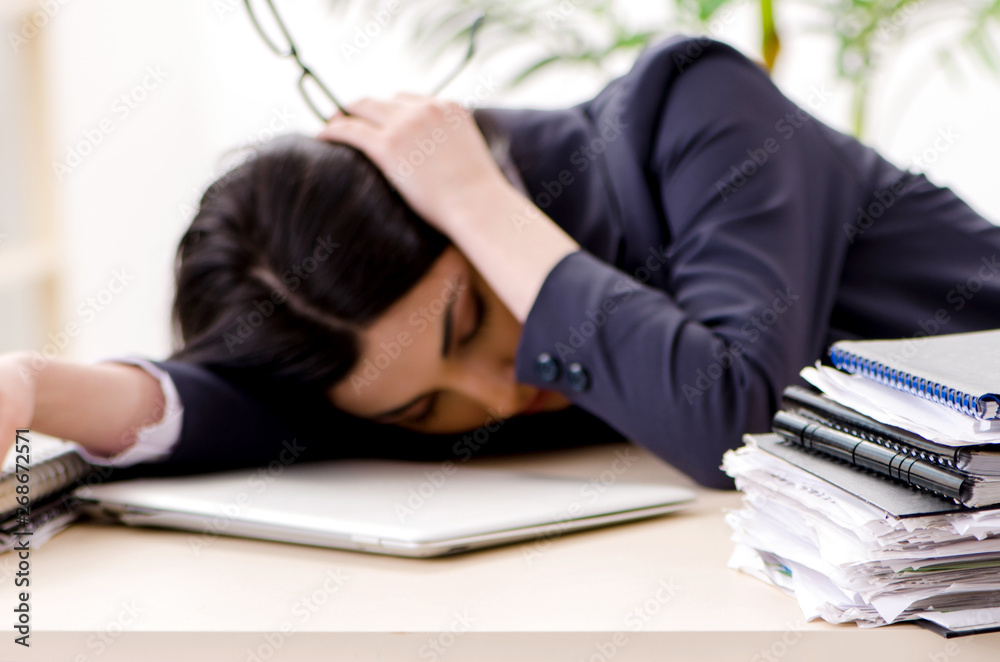 Young businesswoman sitting in the office 