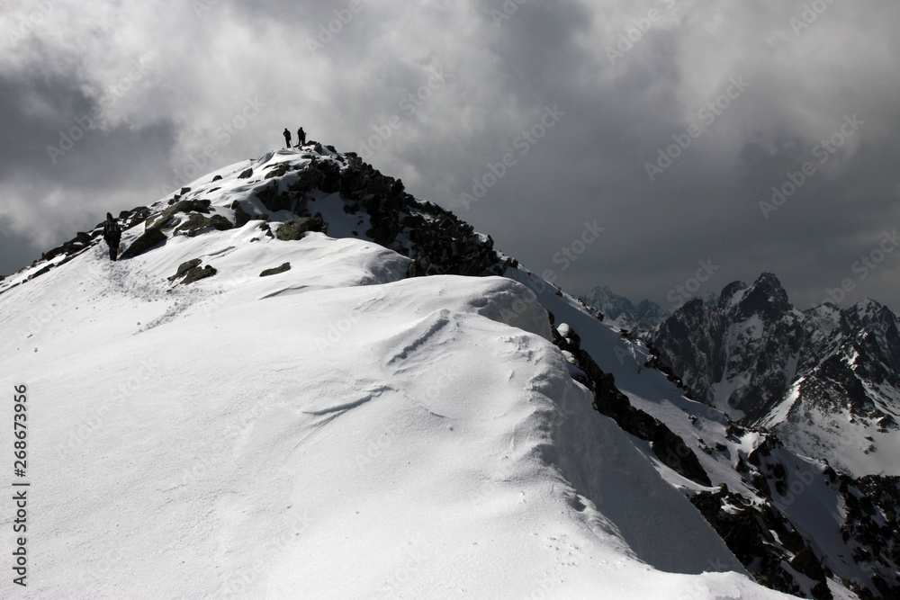Mountaneers on the summit of Slavkovsky stit, Tatra Mountains, Slovakia