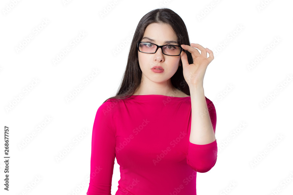 Attractive young woman in glasses with a book.