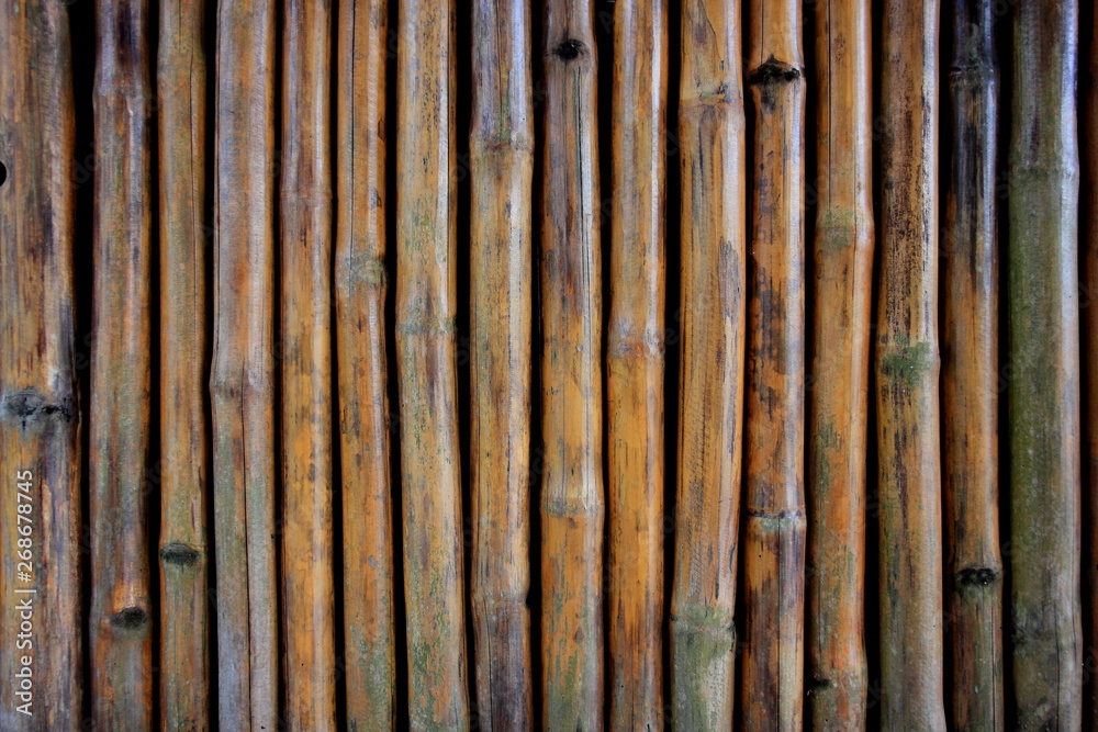 Fototapeta premium Old bamboo placed for the background.