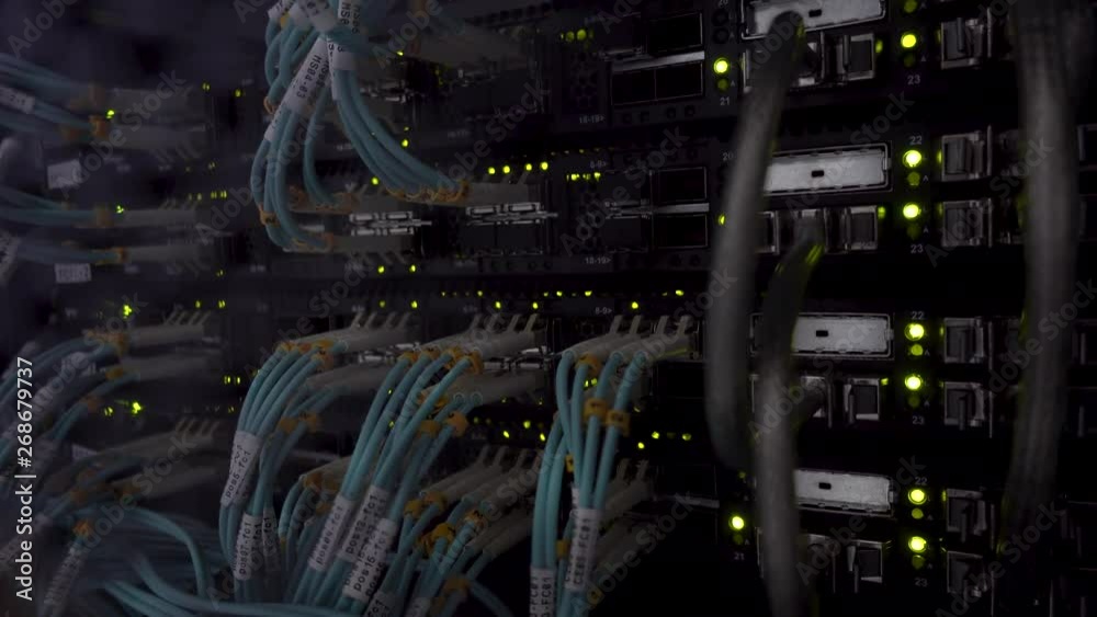 Close up fiber optic cable. Servers racks. Blink light Close up fiber optic cable. Servers racks. Blink light