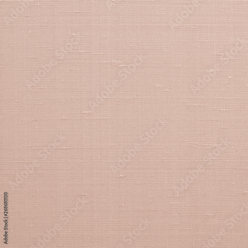 Fine natural cotton silk fabric texture background in light red orange brown color tone
