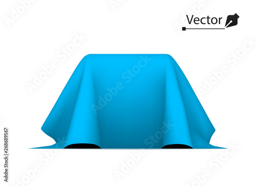 Object covered with blue silk cloth. Empty podium or presentation. Secret box, cube hidden under satin fabric with drapery.