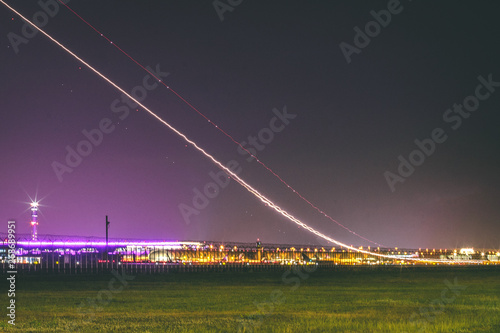 Long exposure shot of airplane taking off