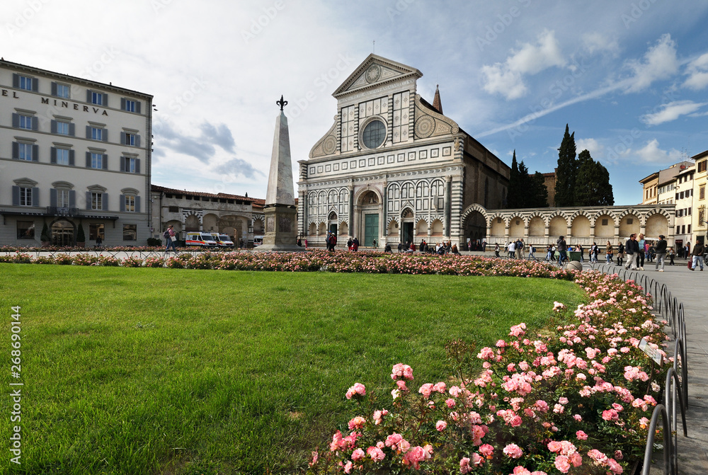The famous Church of Santa Maria Novella with tourists in Florence on a spring day in May. Italy