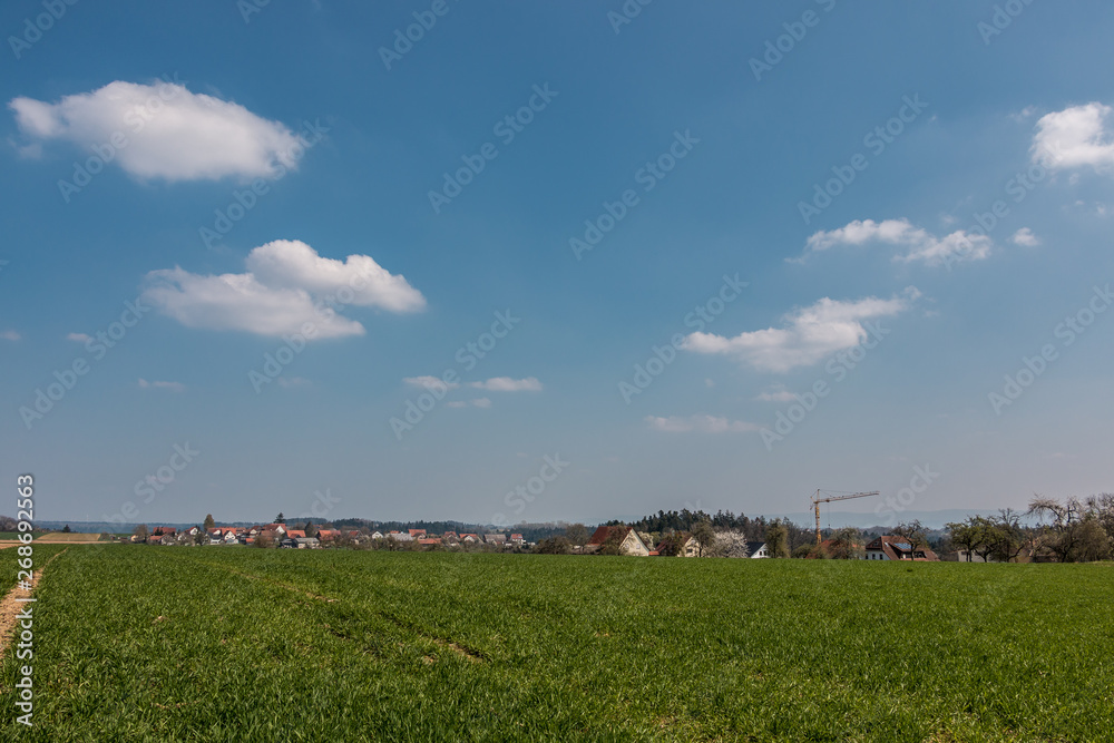Little village in the middle of the german countryside with hills, forests, fields and meadows Little village in the middle of the german countryside with hills, forests, fields and meadows