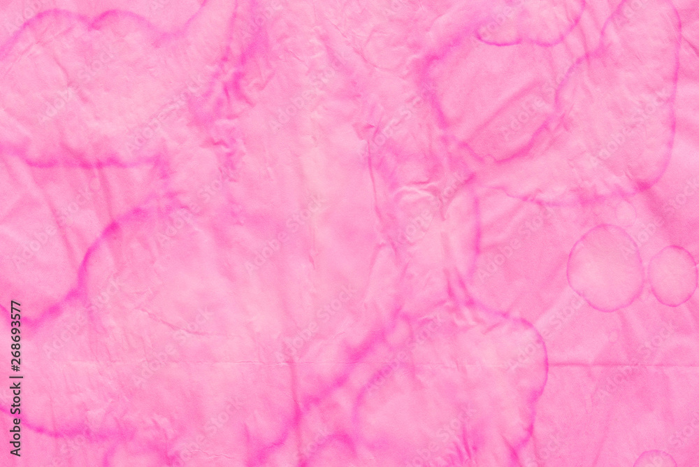 Fototapeta premium pink creased paper tissue background texture