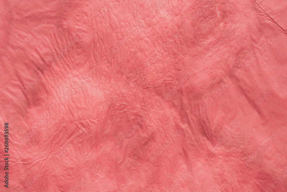 Obraz premium red creased paper tissue background texture