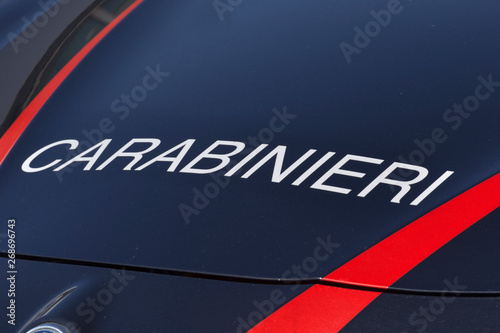 Carabinieri - it's wrote on the front hood of the service car of the first force of the Italian army photo