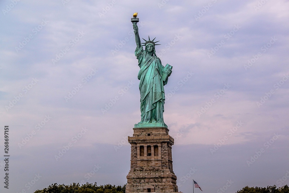 Obraz premium Nice view on isolated Statue of Liberty New York. Beautiful backgrounds.