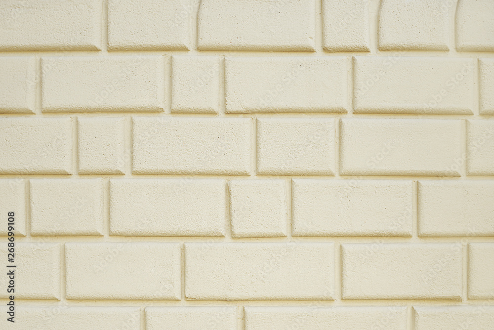 Fototapeta premium Old beige stone wall background texture