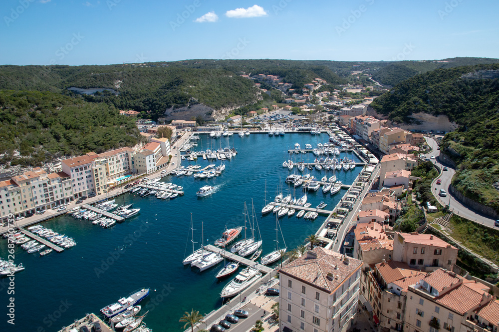 View from above of Bonifacio port in Corsica, France.