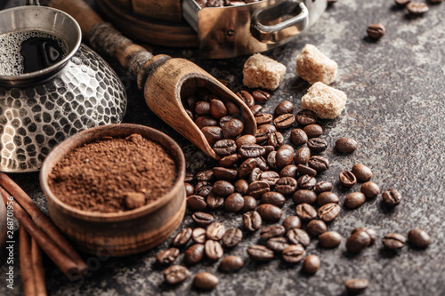 Coffee beans in wooden spoo...