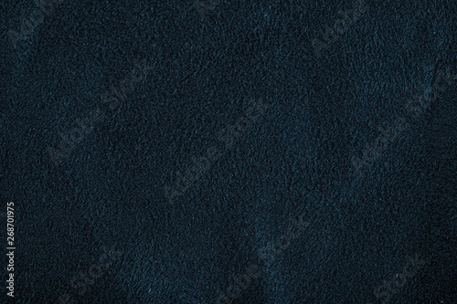 Close up of natural black suede leather background