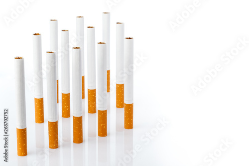 Tobacco smoking. Cigarette close up, isolated on white background.  Bad habit. Nicotine. Drug addiction. Cancer.