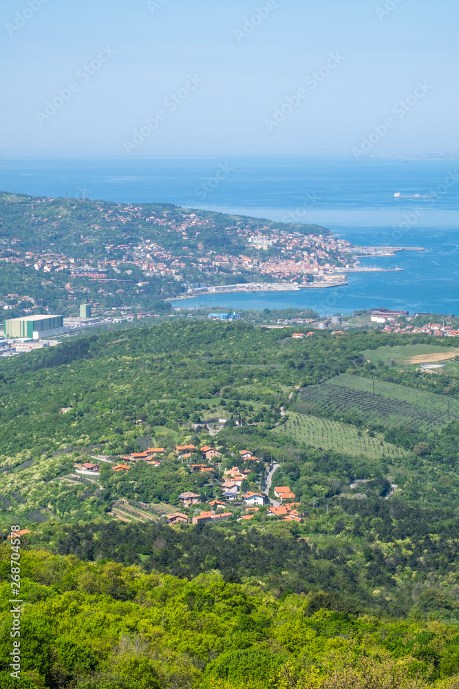 View from castle Socerb over village Caresana to city Muggia